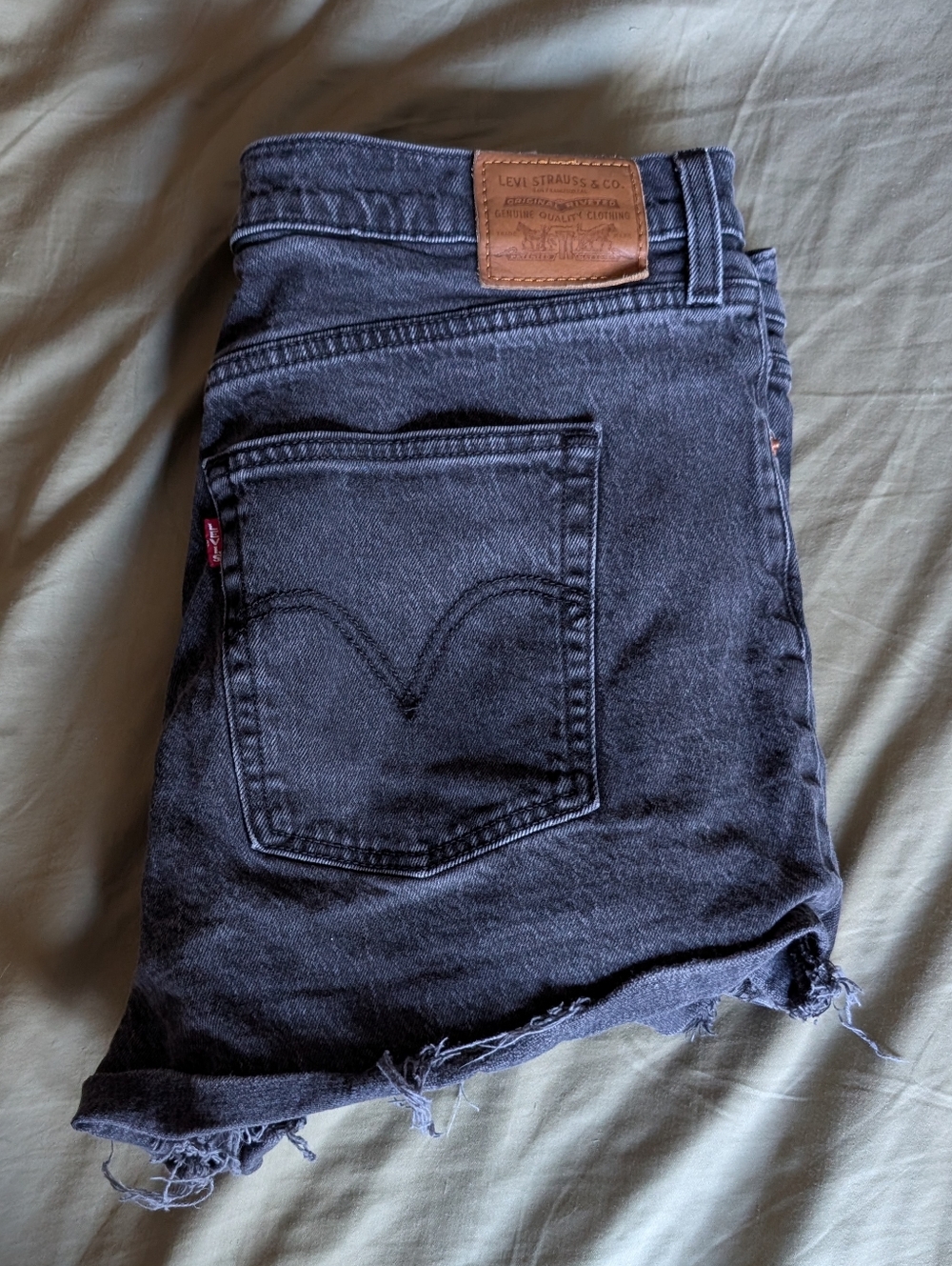 Levi's Washed Black Denim Cutoff Shorts